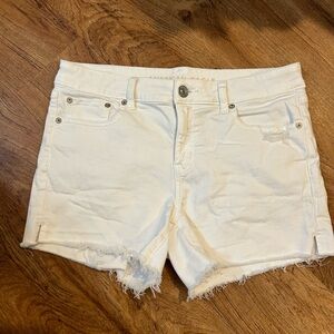 American Eagle White distressed shorts.